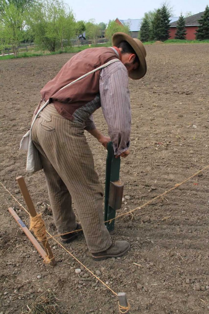 Planting along rows - Photo by Lee Cagle
