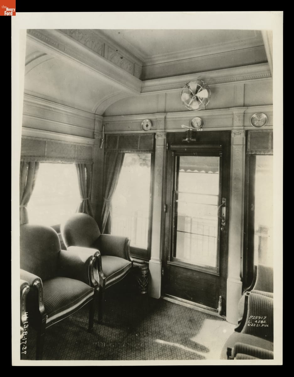 Interior of Henry Ford's Private Railroad Car, "Fair Lane," June 22, 1921 Corner of room with chairs, windows, and doors