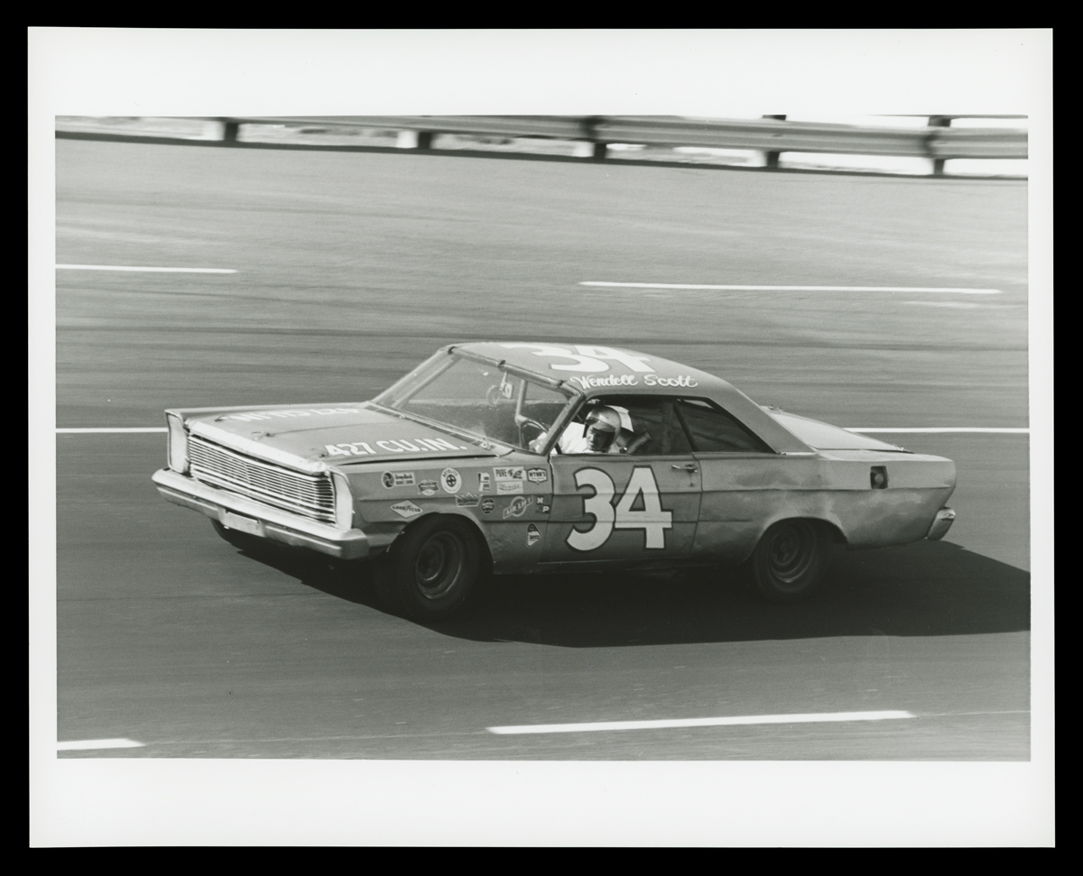 1965 Ford Galaxie Driven by Wendell Scott in the Daytona 500, February 1966 Car, with large number 34 on door, on racetrack