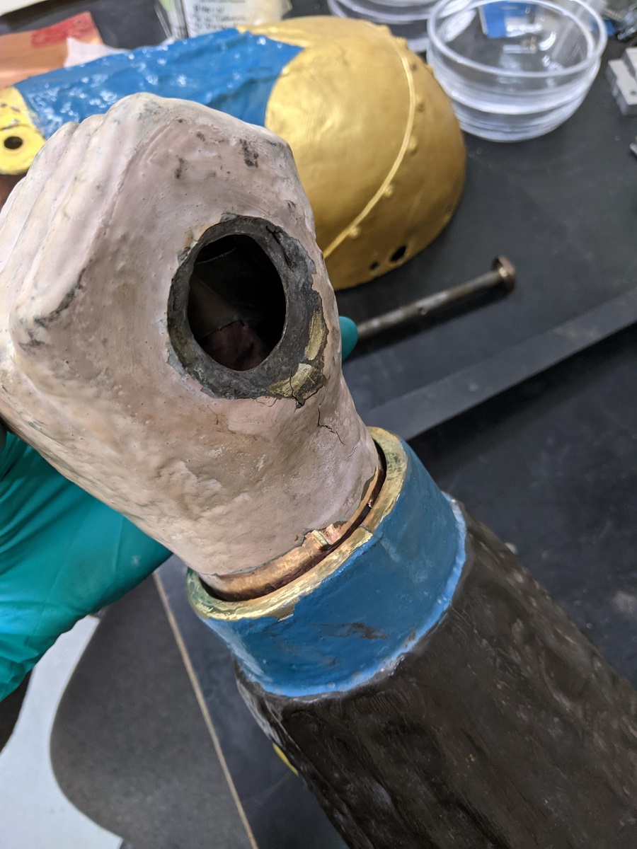 Surface preparation Painted hand- and wrist-shaped object