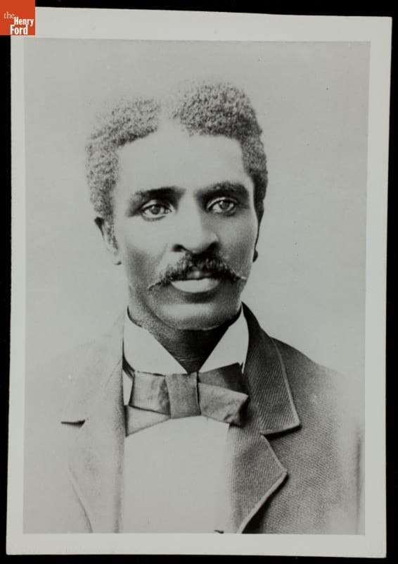 George Washington Carver's Graduation Photo from Iowa Agricultural College and Model Farm, 1893 Portrait of Black man with mustache wearing jacket and tie