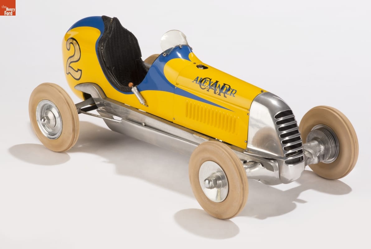 Baby Alexander Gas-Powered Racing Tether Car, 1941 Small blue, yellow, and chrome toy car