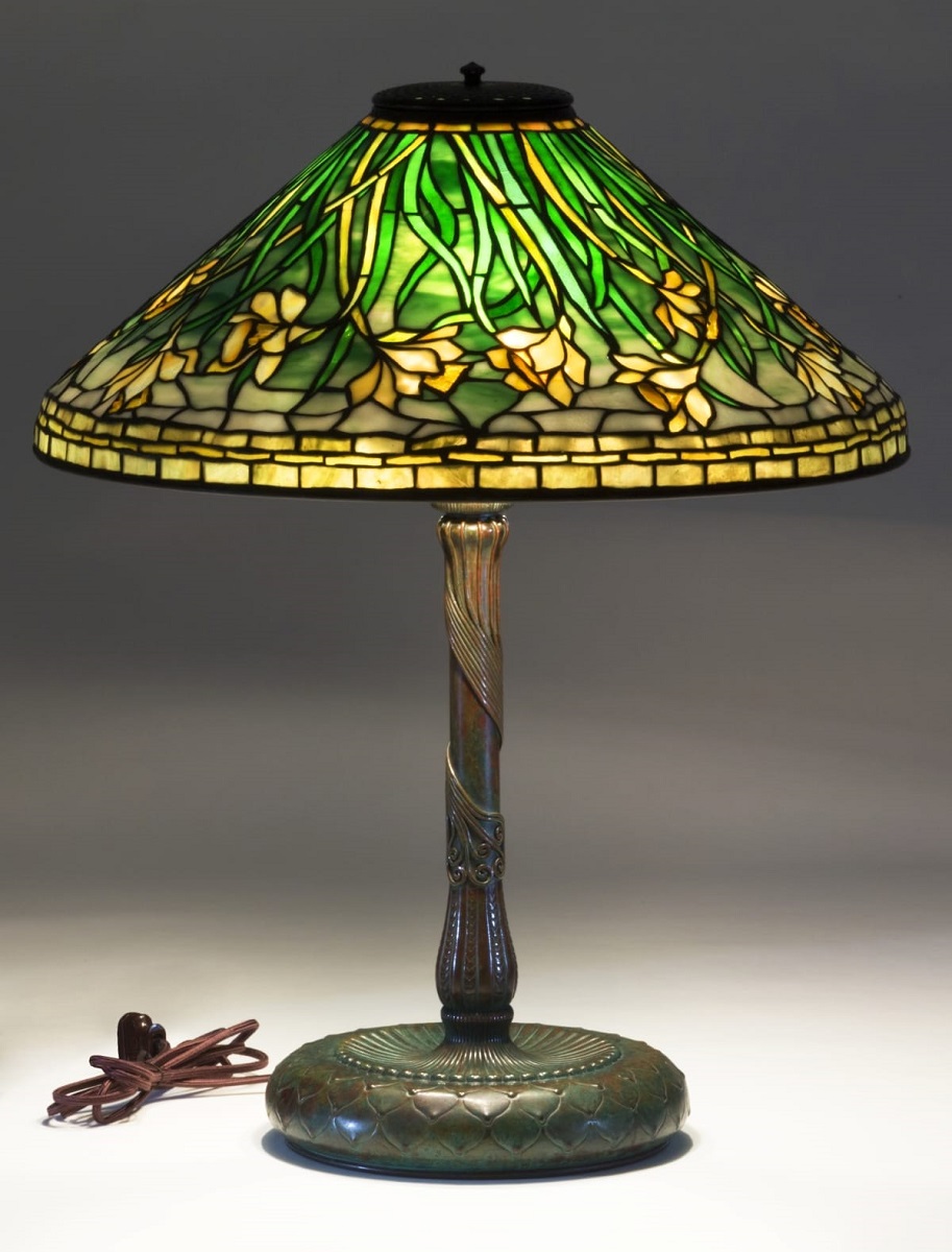 Tiffany Electric Table Lamp, 1903-1920 Bronze table lamp with glass shade with pattern of green and yellow daffodils