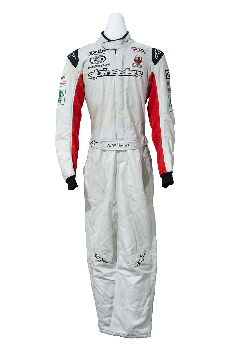 Racing Suit Worn by Armani Williams while Competing in the ARCA Truck Pro Series, circa 2016 White jumpsuit with red panel under each arm and black cuffs and shoulders; also contains text and logos