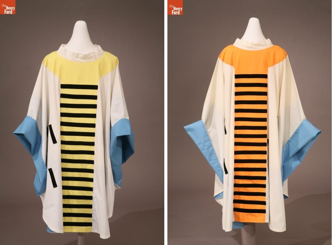 Soprano and Contralto Vocalist Choir Robes Two white robes with blue bands around the wrists, one with a yellow center panel with black stripes; the other with an orange center panel with black stripes