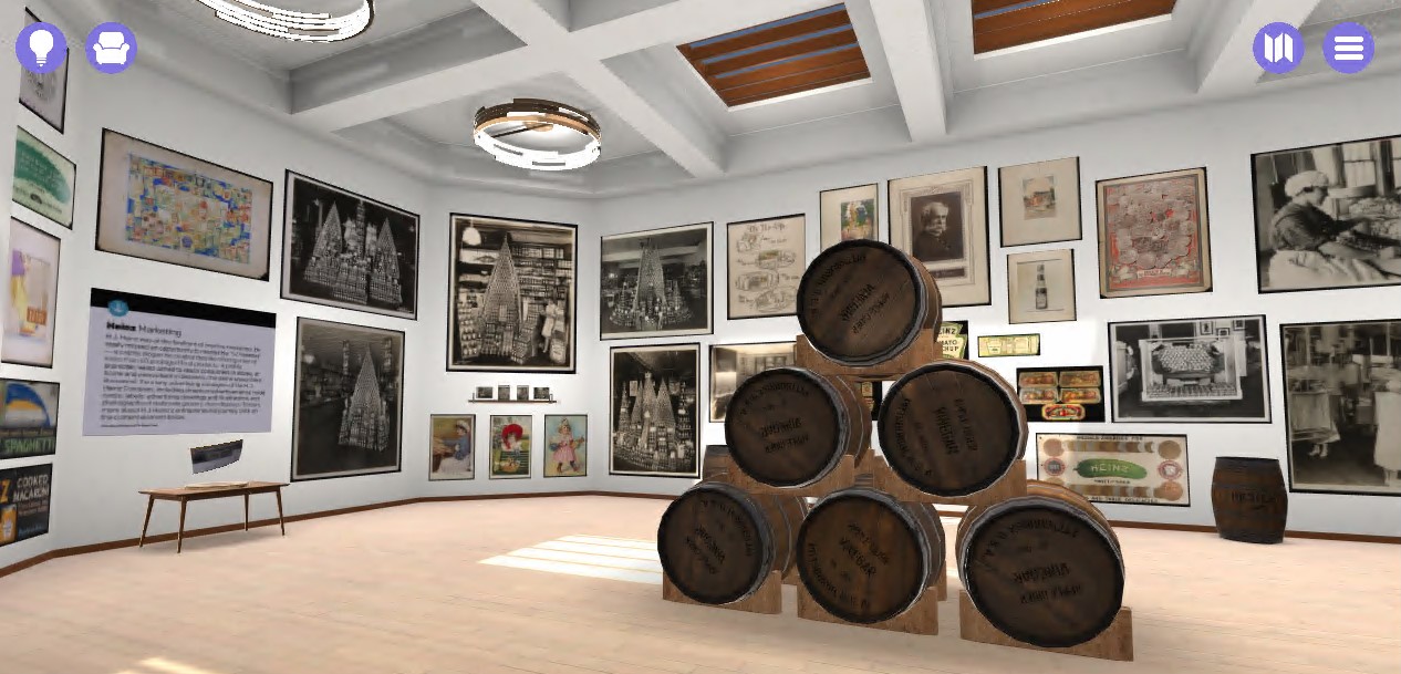 View of The Henry Ford's Entrepreneurship Sagan Virtual Space Virtual gallery space with artifacts on walls and a stack of barrels
