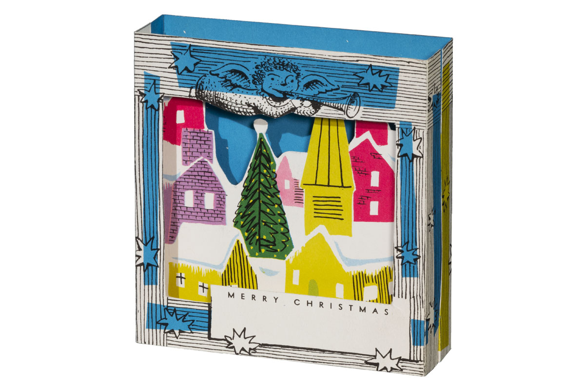 3-Dimensional Christmas Card, "Merry Christmas," circa 1952 Three-dimensional paper card with a frame and angel surrounding a scene of houses and a Christmas tree in snow