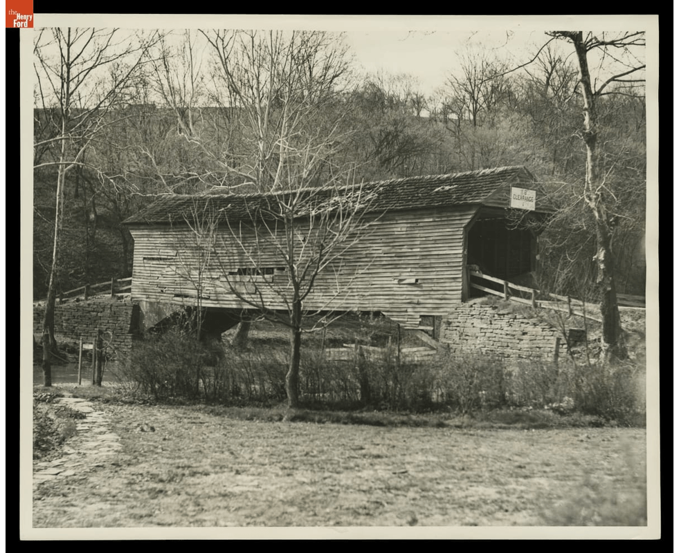 Ackley Covered Bridge at Its Original Site before Relocation to Greenfield Village, 1937 GIF slowly cycling through three views of a wooden covered bridge in some disrepair