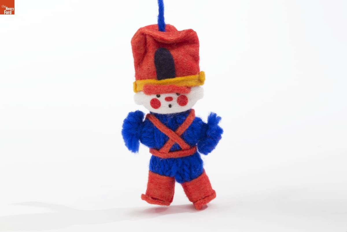 Hallmark "Yarn Ornament: Soldier" Christmas Ornament, 1973 Toy soldier ornament with blue yarn body, red felt hat, suspenders, and boots, and white felt face