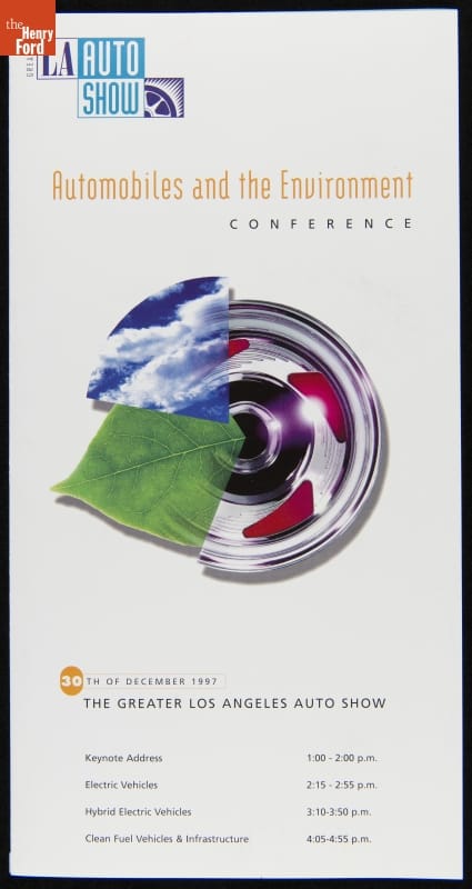 Automobiles and the Environment Conference at the 1998 Greater Los Angeles Auto Show Hubcap overlaid with leaf and arc of blue sky with clouds, all on white background; contains text