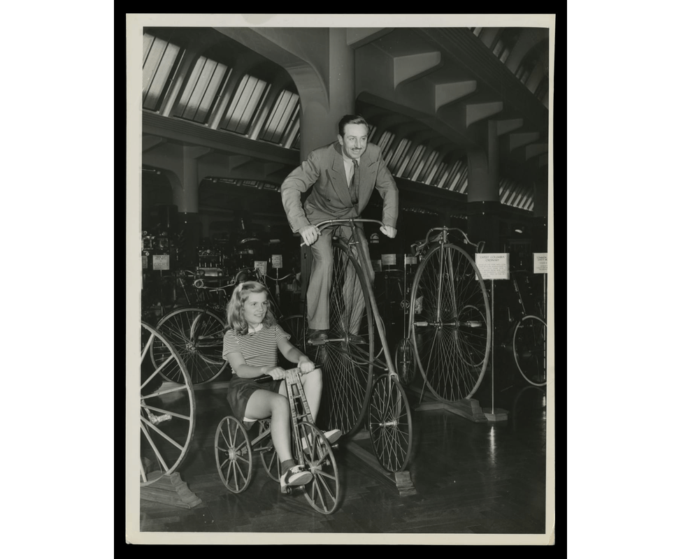Walt Disney and Family Visiting Henry Ford Museum, August 1943 GIF slowly cycling through three images of man and young girl in a museum