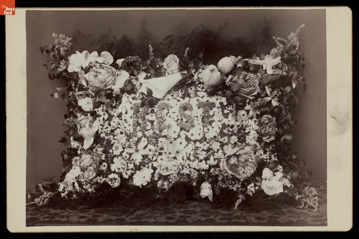 Memorial Floral Arrangement, circa 1878 Black-and-white image of pillow-shaped arrangement of flowers and greenery