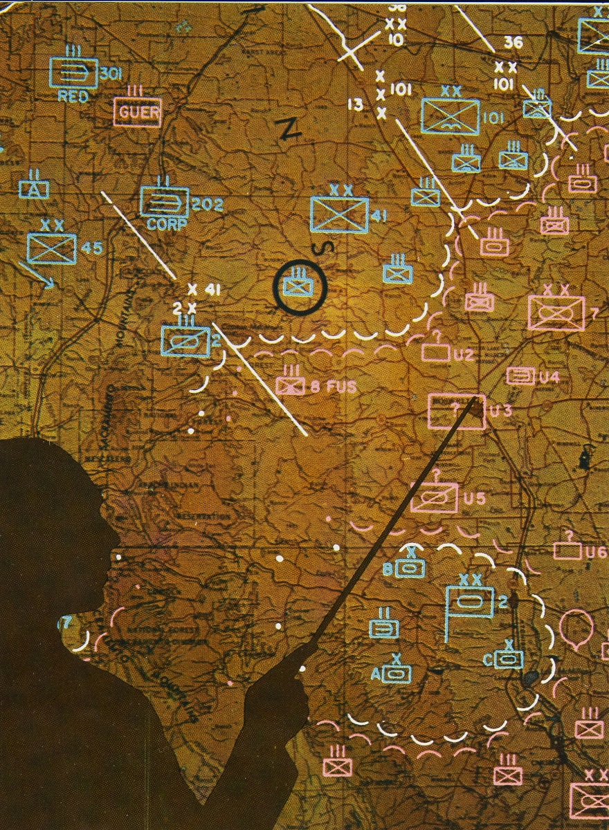 Aeronutronic, Fall 1960 Silhouette of person holding pointer to topographic map with pink, blue, and white projected notations on it