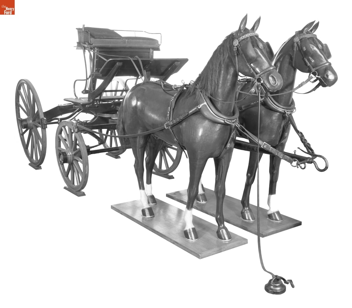 Skeleton Break, circa 1900 Minimal wagon with just a seat and four wheels, hitched to two horse mannequins