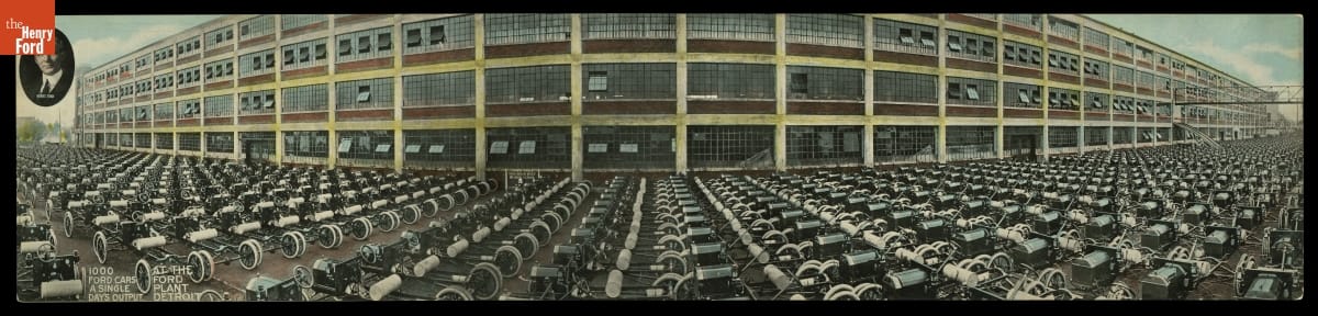 Ford Motor Company Highland Park Plant Showing One Day's Output of 1000 Cars, 1913 Panoramic image of brick building with many windows behind parking lot completely filled with cars