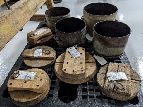 Cheese Followers Cheese containers with wooden “followers” to form wheels of cheese