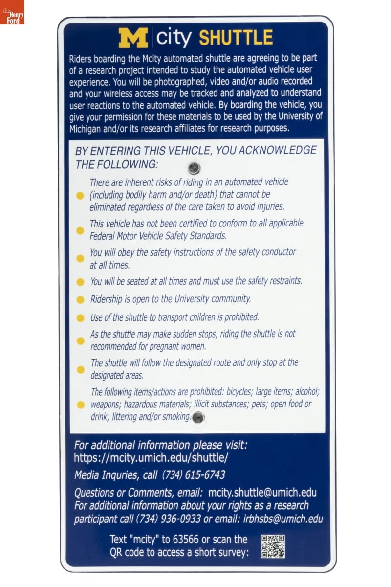 Mcity Shuttle Rules Sign, 2018 Blue and white sign with text