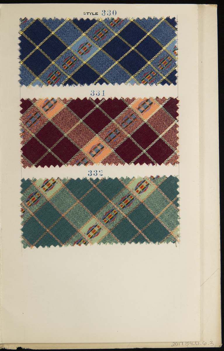 Sample Book for Lancaster Mills, "36 Inch Klinton Fancies," Fall 1927 Page containing three plaid fabric swatches in blue, brown, and green