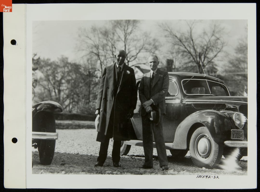 Henry Ford and George Washington Carver, Tuskegee, Alabama, March 1938 Two men, one Black and one white, pose in front of a car