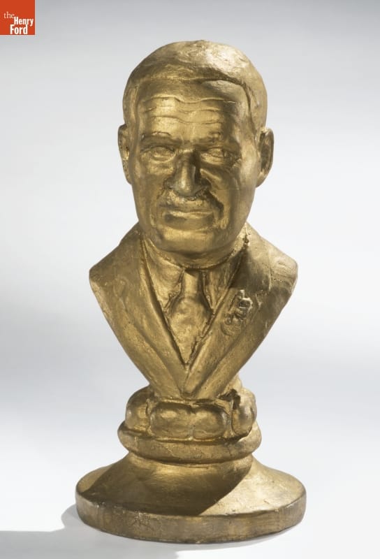 Bust of George Washington Carver, circa 1941 Gold sculpture of man's face and partial torso