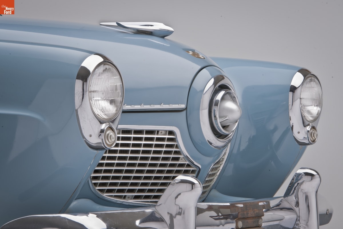 1951 Studebaker Champion Starlight Coupe (front) Close-up of car grille with pointed areas at either end housing headlights and in the middle