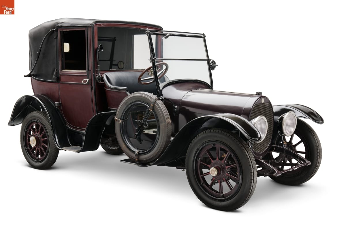 1915 Brewster Town Landaulet Boxy maroon and black car with open driver's seat