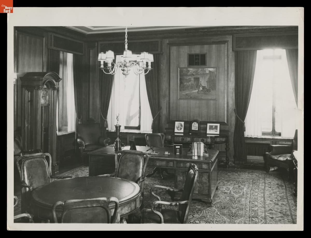 Henry Ford's Office in the Ford Engineering Laboratory, December 1949 Interior of office with carpet, wooden furniture, and two windows behind desk
