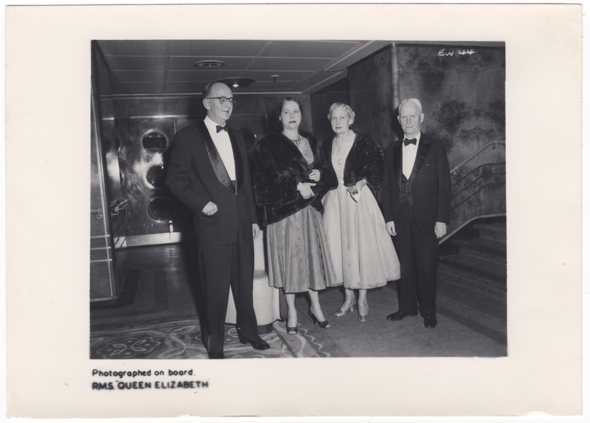 Catherine Roddis with her son-in-law and daughter, Henry and Sara Jones, and husband Hamilton Black-and-white photo of two men in tuxedos and two women in evening gowns and short fur jackets