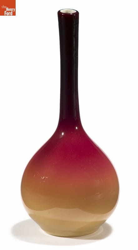 Peachblow Vase, circa 1886 Vase with round body and long, thin neck, morphing in color from yellow at the bottom through orange and red to dark red at the top
