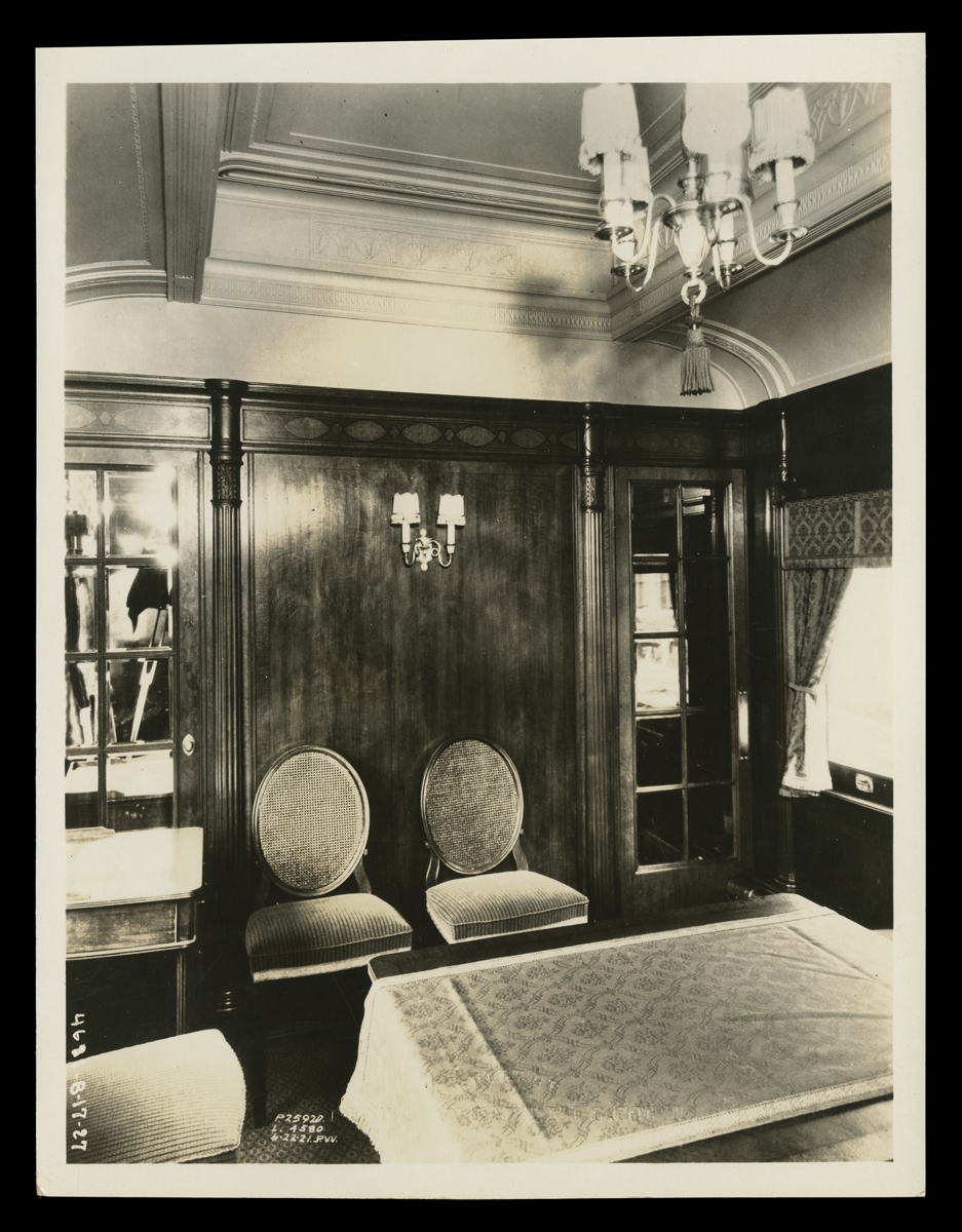 Interior of Henry Ford's Private Railroad Car, "Fair Lane," June 22, 1921 Interior of room with wood paneling, arched ceiling, and furniture