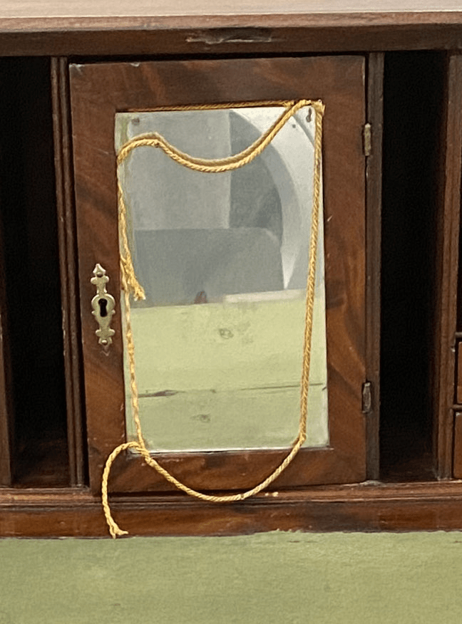 What’s behind the mirrored door?