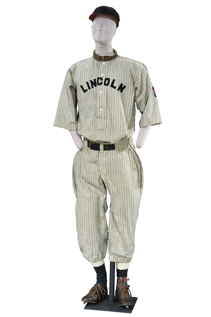 Baseball uniform, about 1920, worn by Harry B. Mosley of Detroit, Michigan Mannequin wearing striped baseball uniform (shirt, pants, stockings, cleats, and cap)