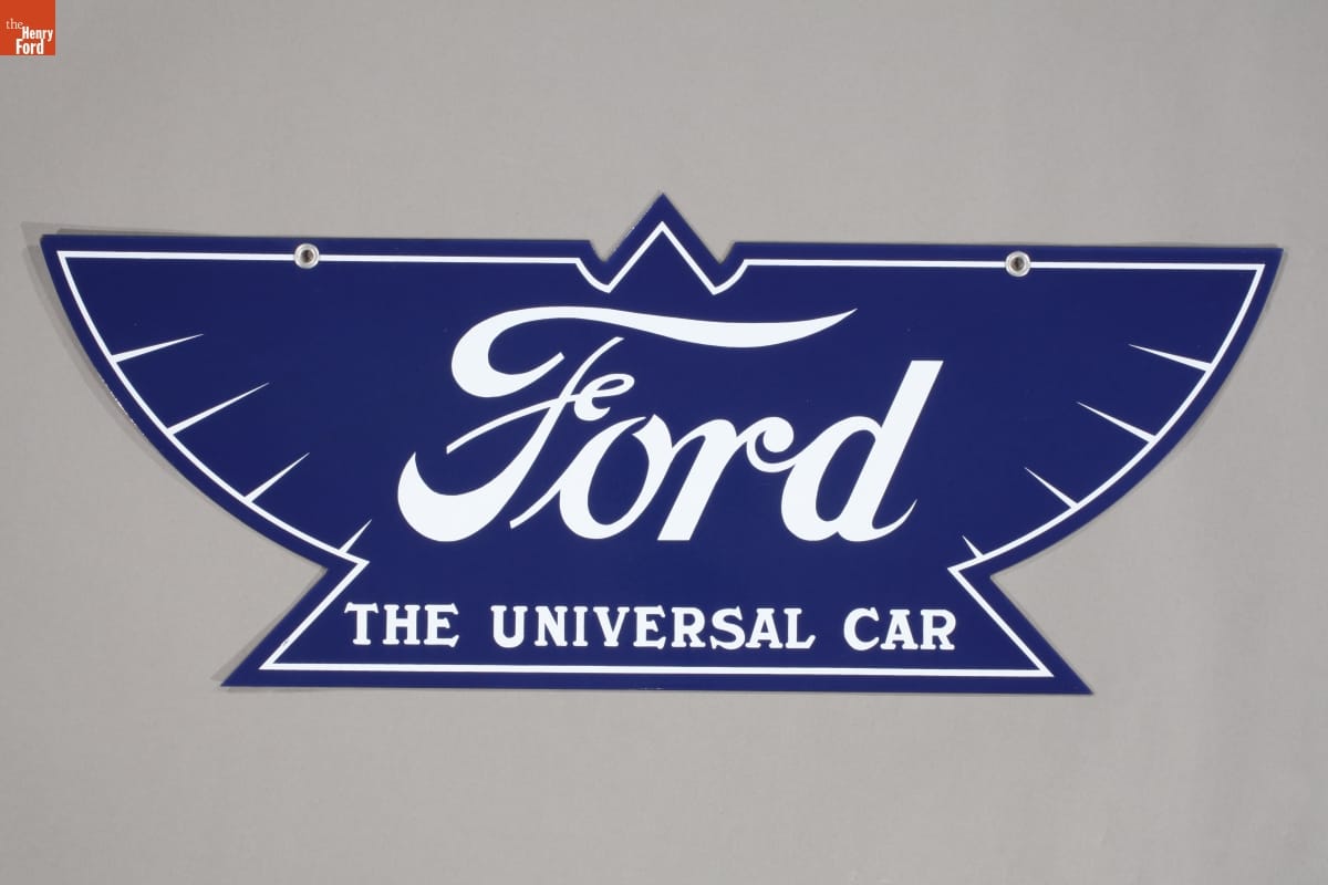 Ford "The Universal Car" Sign, 1910-1918 Blue sign in the shape of a stylized eagle with white text "Ford, The Universal Car"