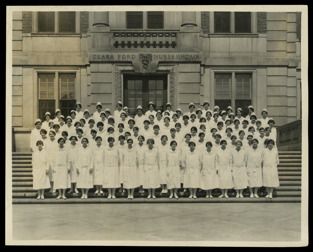 Student Nurses in Front of Clara Ford Nurses Home at Henry Ford Hospital, Detroit, Michigan, circa 1926 Group of women in nurses' uniforms stand on the steps of a building inscribed "Clara Ford Nurses Home"
