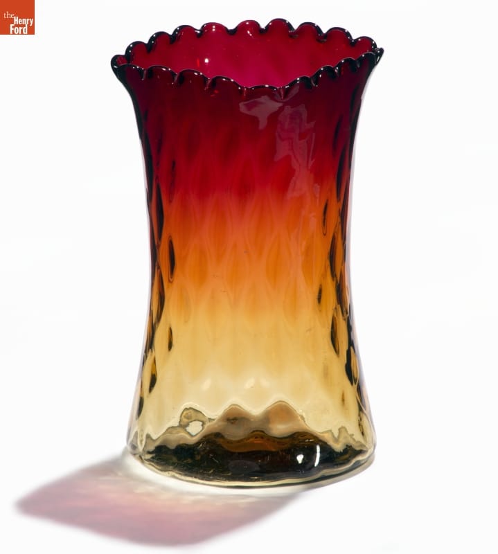Amberina Vase, 1883-1890 Glass vase with slightly indented sides and a diamond-patterned texture, yellow at bottom morphing to dark red at top