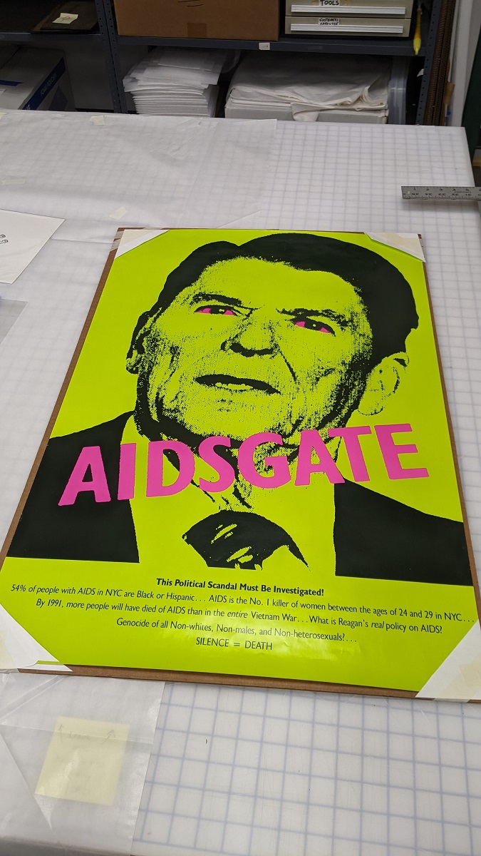Acid yellow/lime green poster with image of Ronald Reagan's face and text