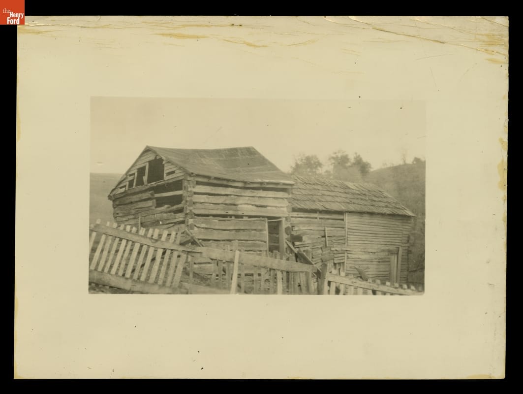 William H. McGuffey Birthplace at Its Original Site, West Finley, Pennsylvania, 1932 Matted photograph of run-down looking wooden building with equally run-down looking fence in front