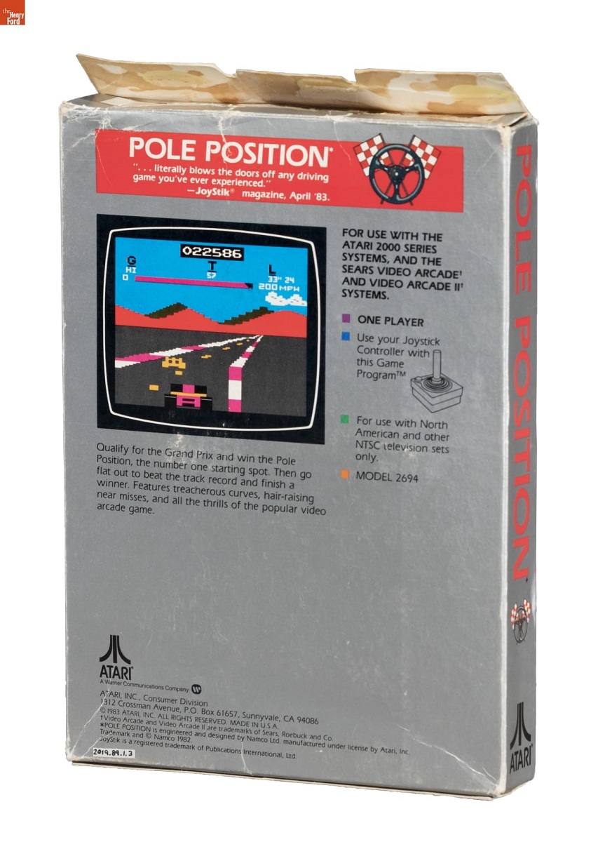 Atari Video Game, "Pole Position," 1983 / back of box Silver box with text and screenshot from video game of cars on a racetrack
