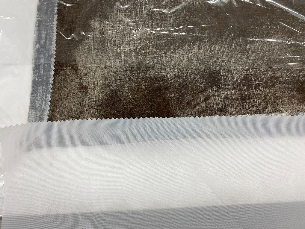 Sail cloth added to edges of original canvas Corner showing several layers of fabric