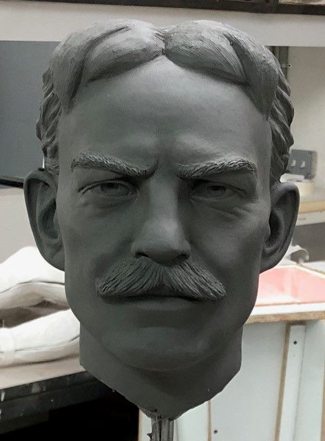 Sculpture of Henry Ford's head Head of man with mustache