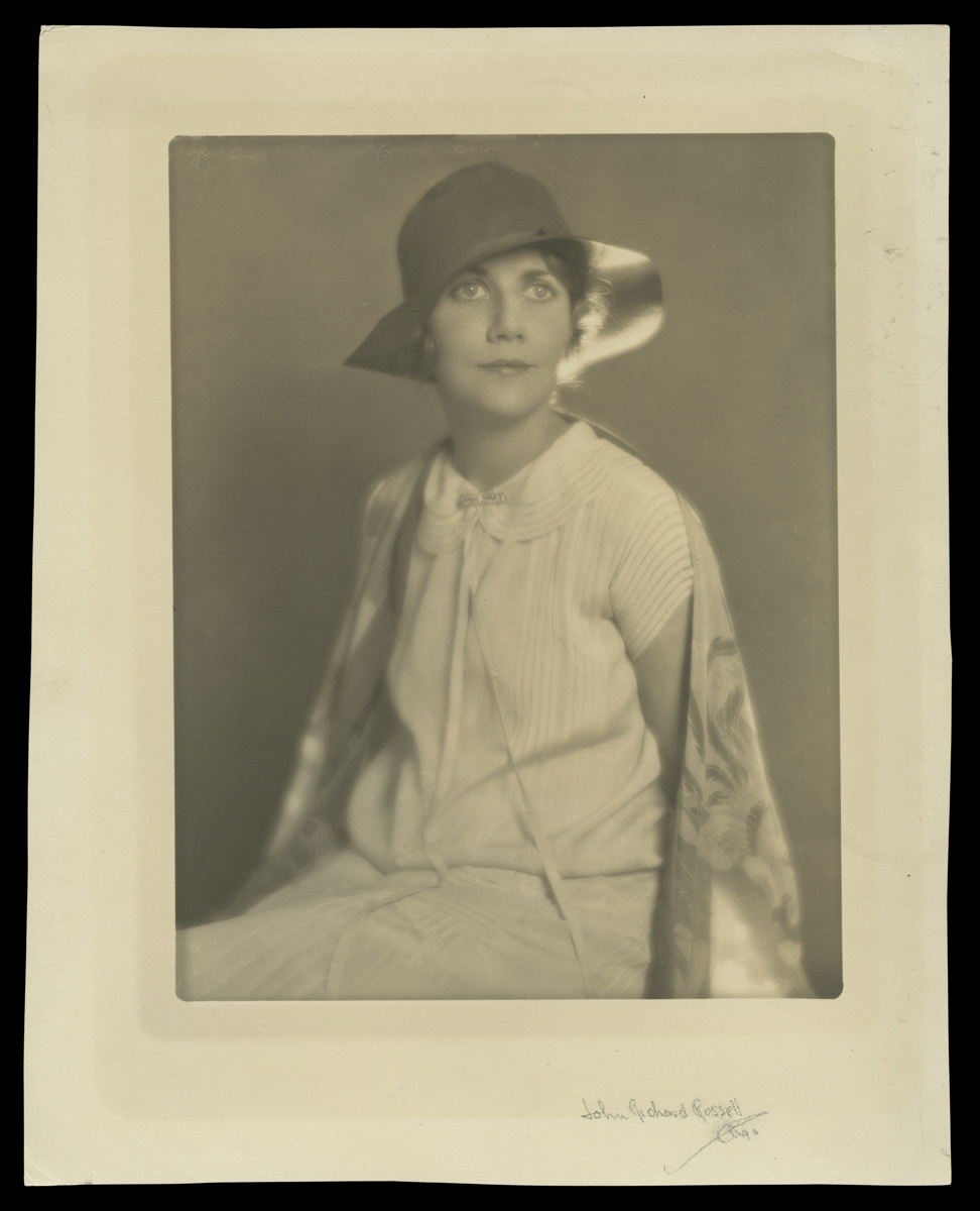 Portrait of Elizabeth Parke Firestone, circa 1927 Black-and-white photo of seated woman in dress and hat