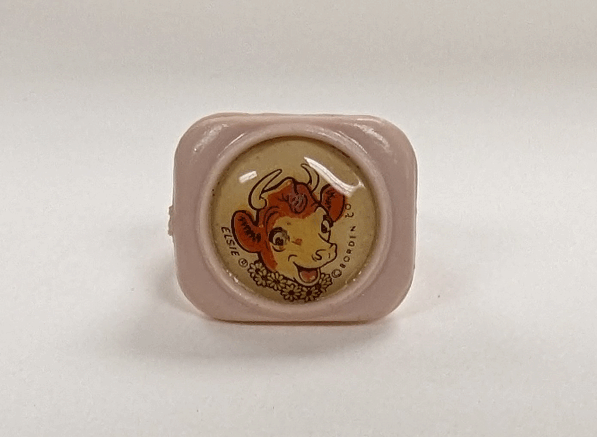 PXL_20230719_184016686 "Elsie the Borden Cow” souvenir ring from the 1964-1965 World’s Fair.