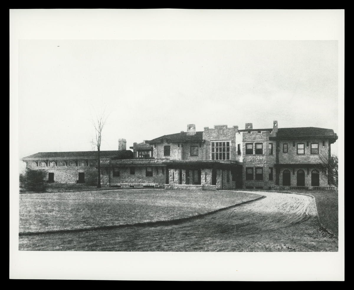 Front Entrance to Fair Lane, Home of Henry Ford, March 1916 Black-and-white photo of large stone house with turrets