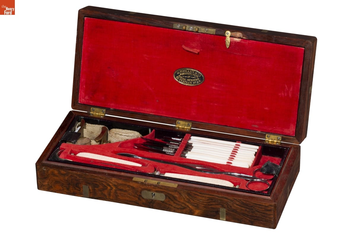 Set of Surgical Instruments, 1855-1865 Wooden box lined with red velvet, containing scissors, knives, bandages, and other implements