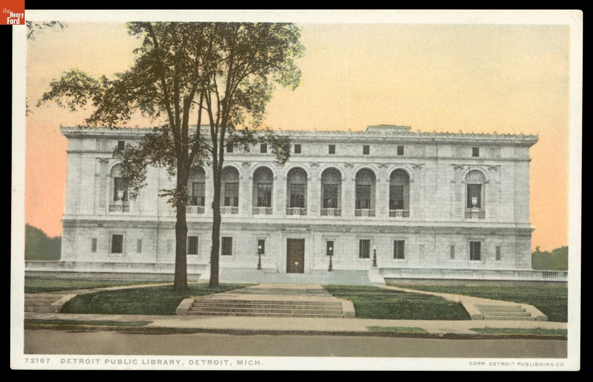 Postcard depicting the front street view of the public library in Detroit, Michigan in 1921