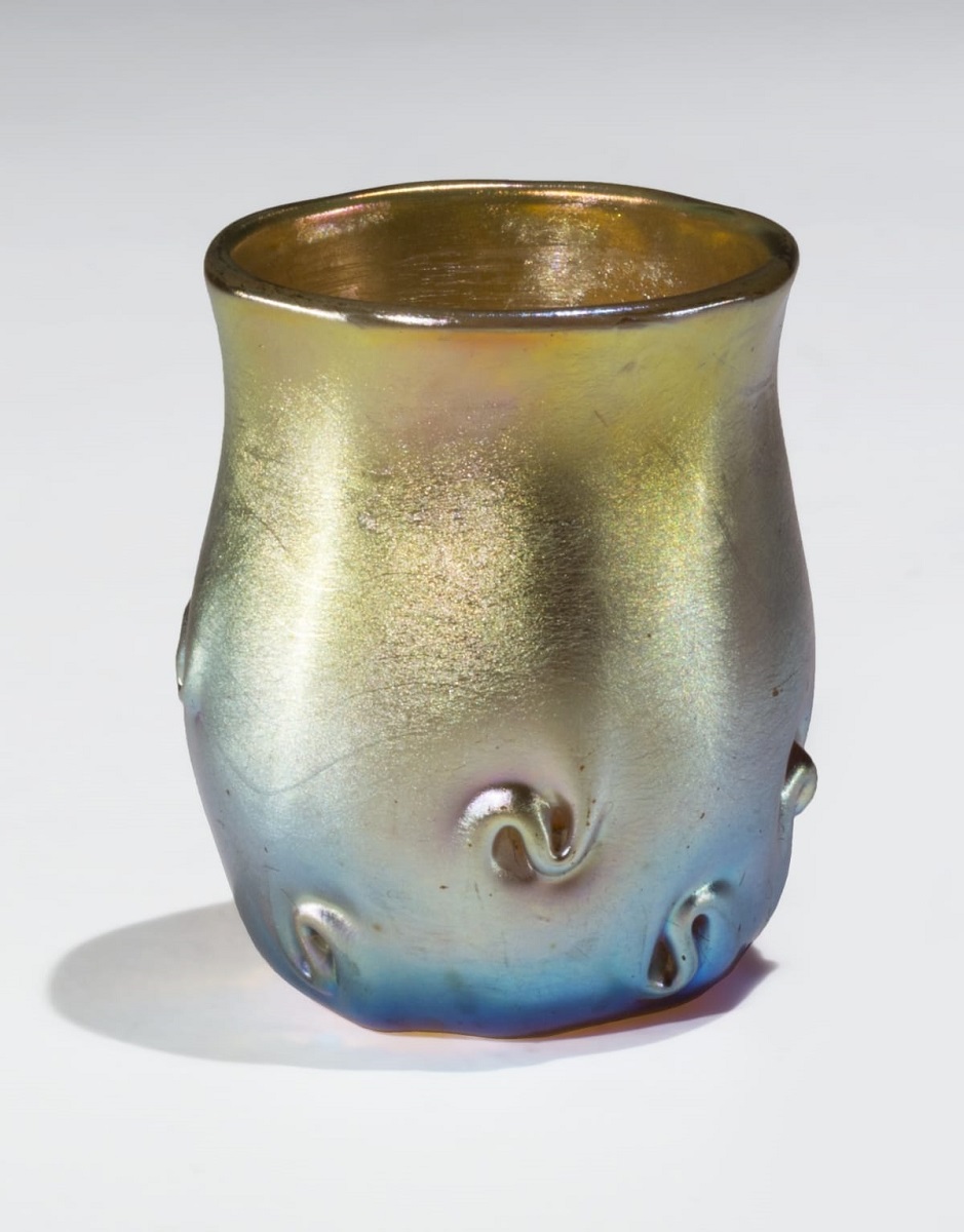 Favrile Toothpick Holder, circa 1895 Iridescent glass container with s-shaped swirls, with color morphing from blue at the bottom to gold at the top