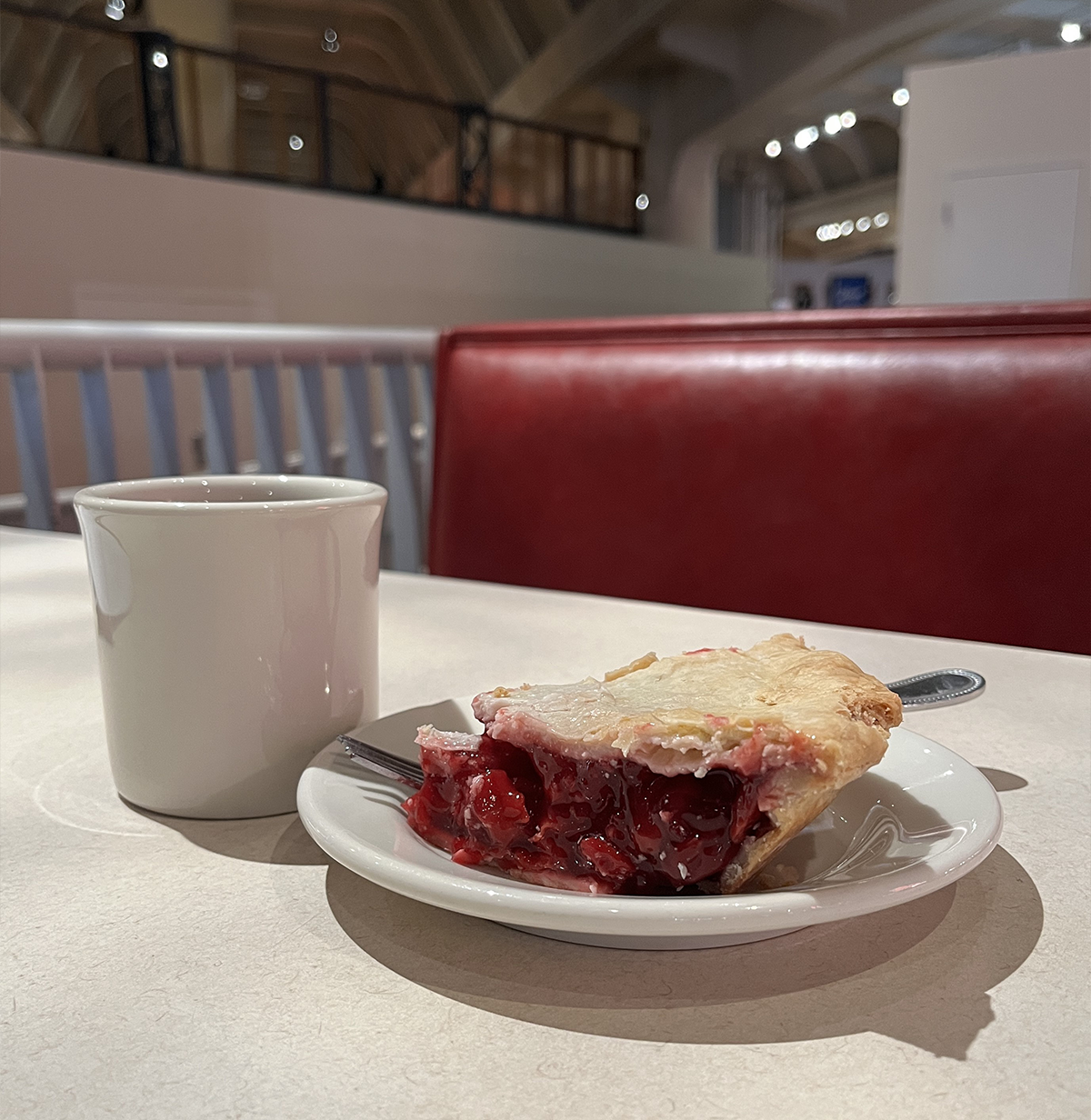 Hot coffee and slice of cherry pie served at Lamy’s Diner on Homer Laughlin China Company mug and plate. / Photo by Aimee Burpee