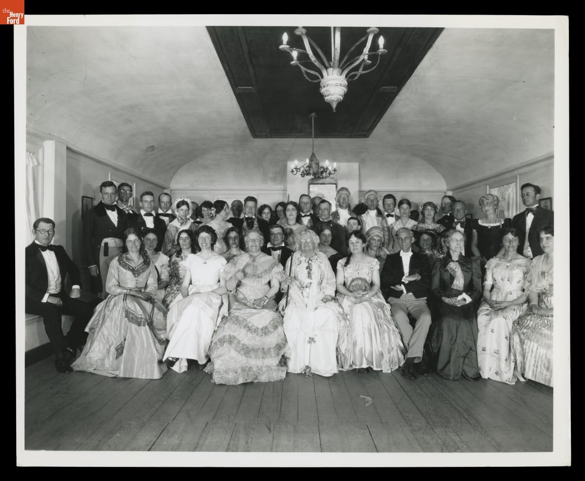 HF costumed party Dressed in 19th-century clothing, Henry, his wife, Clara, and their guests in the ballroom of the Wayside Inn in Sudbury, Massachusetts, in 1926.