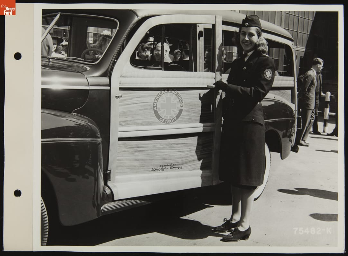 The 29 Millionth Ford and a driver from the Detroit chapter of the American Red Cross Women's Motor Corps
